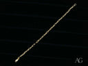Thin solid 18k gold link bracelet with paperclip chain and lobster clasp