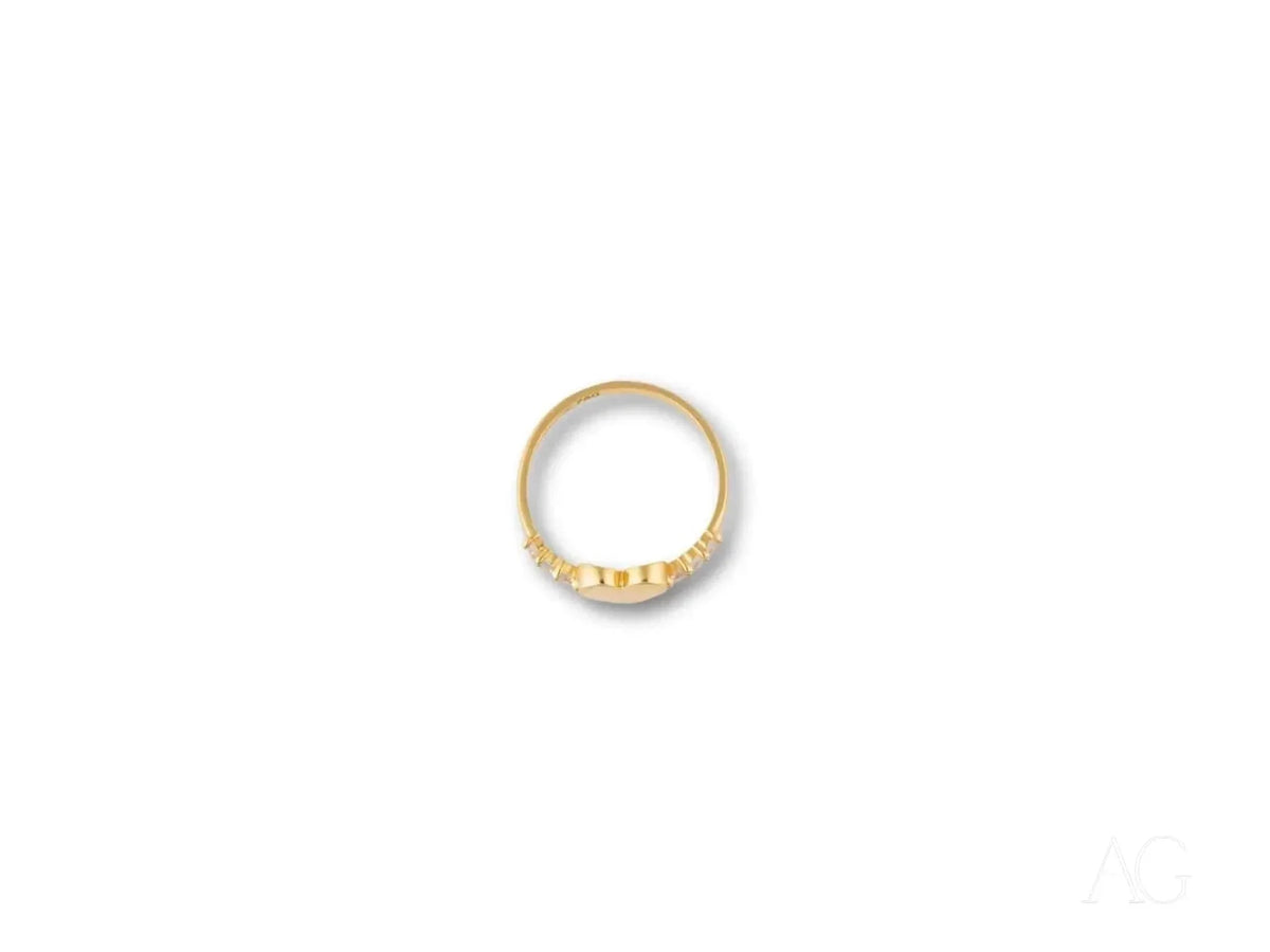 Elegant 18k gold CZ heart ring with hexagonal top and studded sides