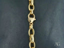 Elegant solid 18k gold men’s bracelet with classic link pattern and lobster clasp