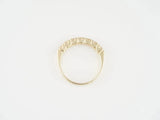 Exquisite 18k yellow gold ring with five round-cut diamonds, timeless elegance