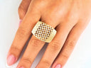 Elegant diamond cut 18k yellow gold ring with perforated rectangular design