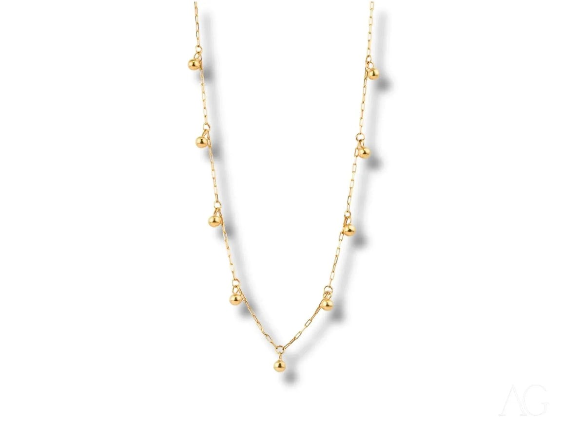Elegant 18k gold beaded necklace with spherical charms