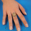 Elegant personalized initial letter ring in 14k gold with art gold signature design on finger