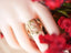 Elegant 14k gold initial letter ring with textured engraved design on finger for art gold signature style