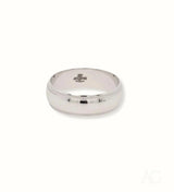 Elegant white 18k gold wedding band with beveled edges