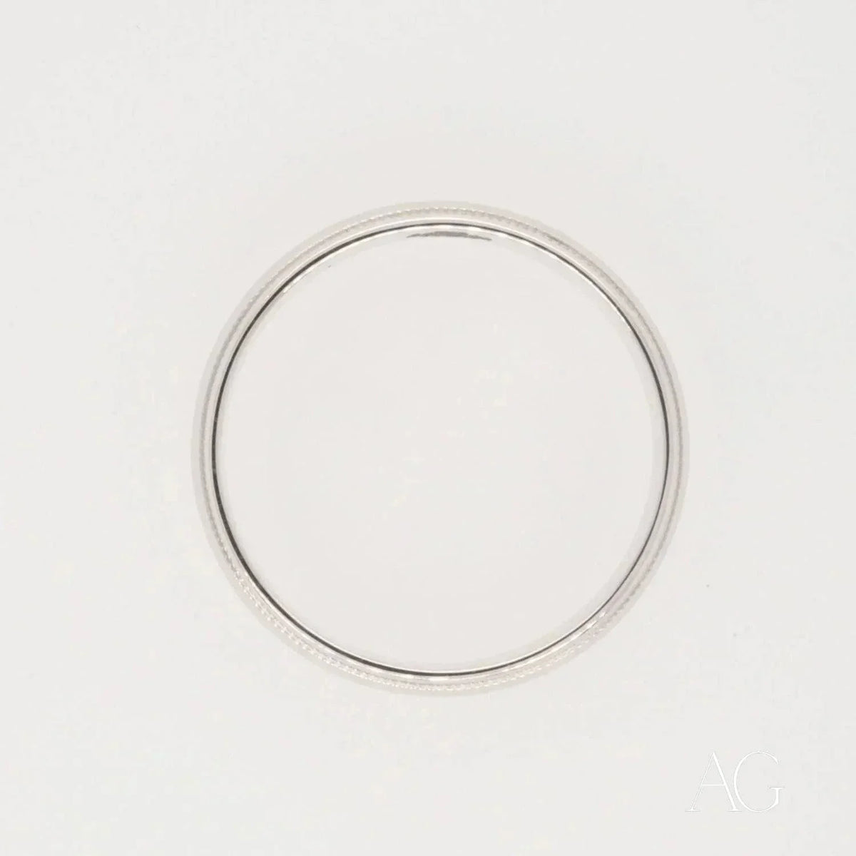 Elegant white 18k gold wedding band with thin silver finish