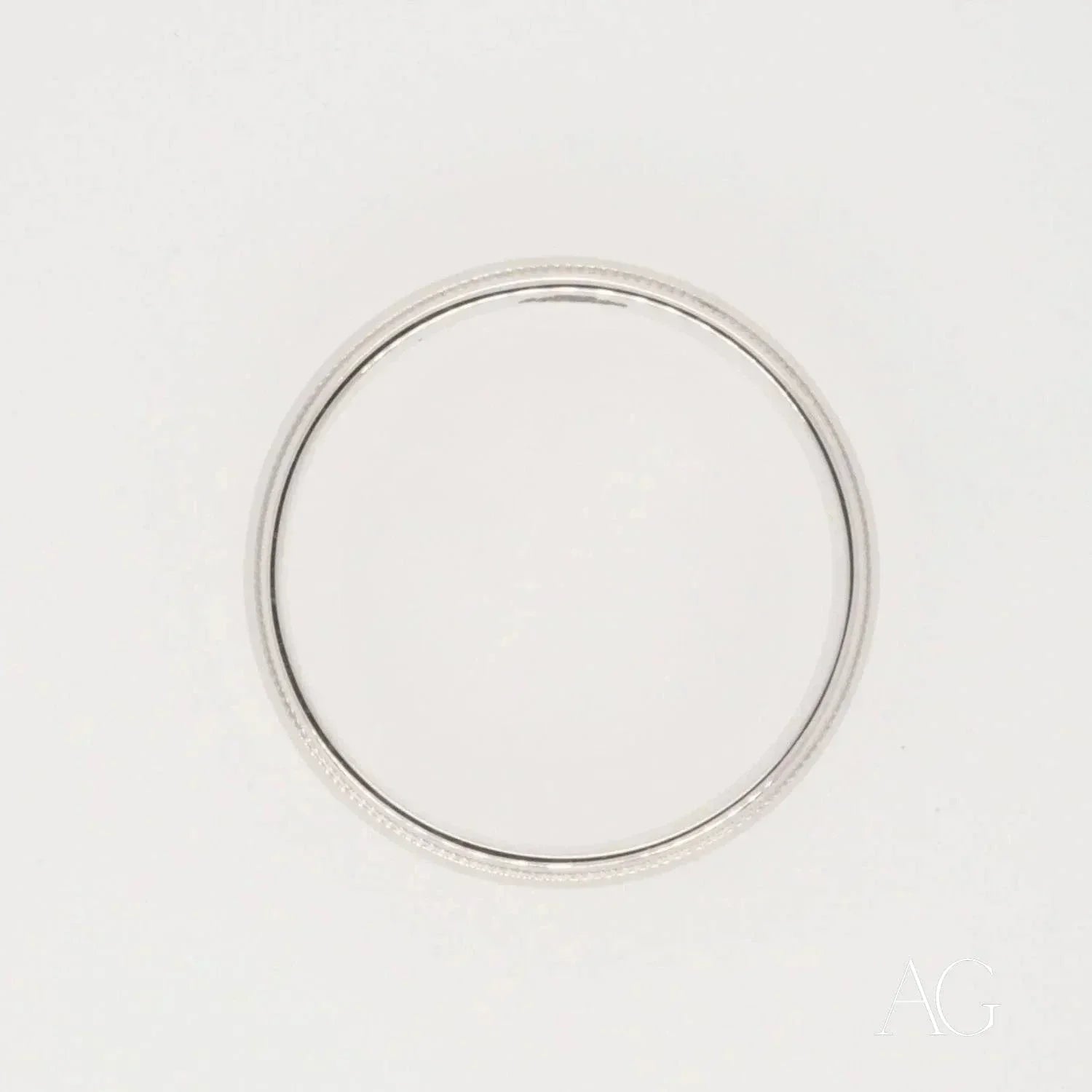 Elegant white 18k gold wedding band with thin silver finish