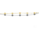 Delicate solid 18k gold bracelet with five luxurious gold orbs and spring ring clasp