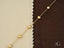 Elegant women’s 18k solid gold bracelet with luxurious gold orbs and spring ring clasp