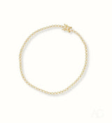 Elegant yellow gold tennis bracelet with brilliant-cut diamonds, Greater Boston area art gold jewelry