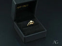 Open 18k gold light engagement ring with square diamond in black box