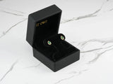 Emerald Halo 18K gold green CZ earrings in black jewelry box