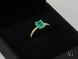 Emerald Majesty 18K gold ring with radiant-cut emerald and diamonds
