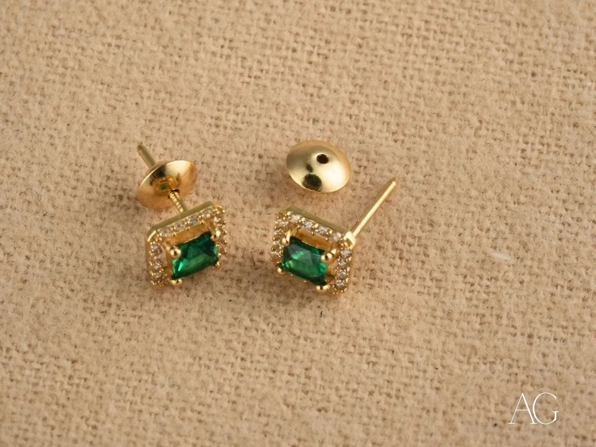 Emerald Radiance 18k gold halo stud earrings with green cubic zirconia