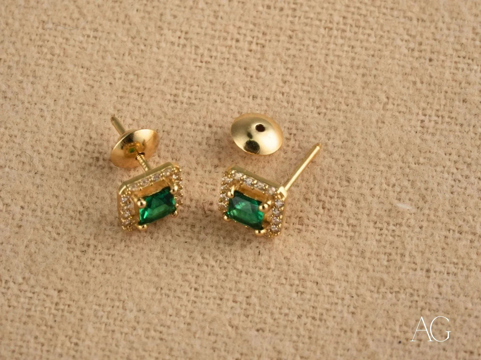 Emerald Radiance 18k gold halo stud earrings with green cubic zirconia