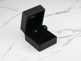 Emerald Radiance 18k gold green cubic zirconia stud earrings in black box