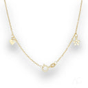 Enchanting 18k gold anklet with sparkling zirconias and charming pendants