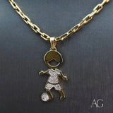 Enchanting 18K gold Boy soccer doll pendant with CZ accents hanging from a chain