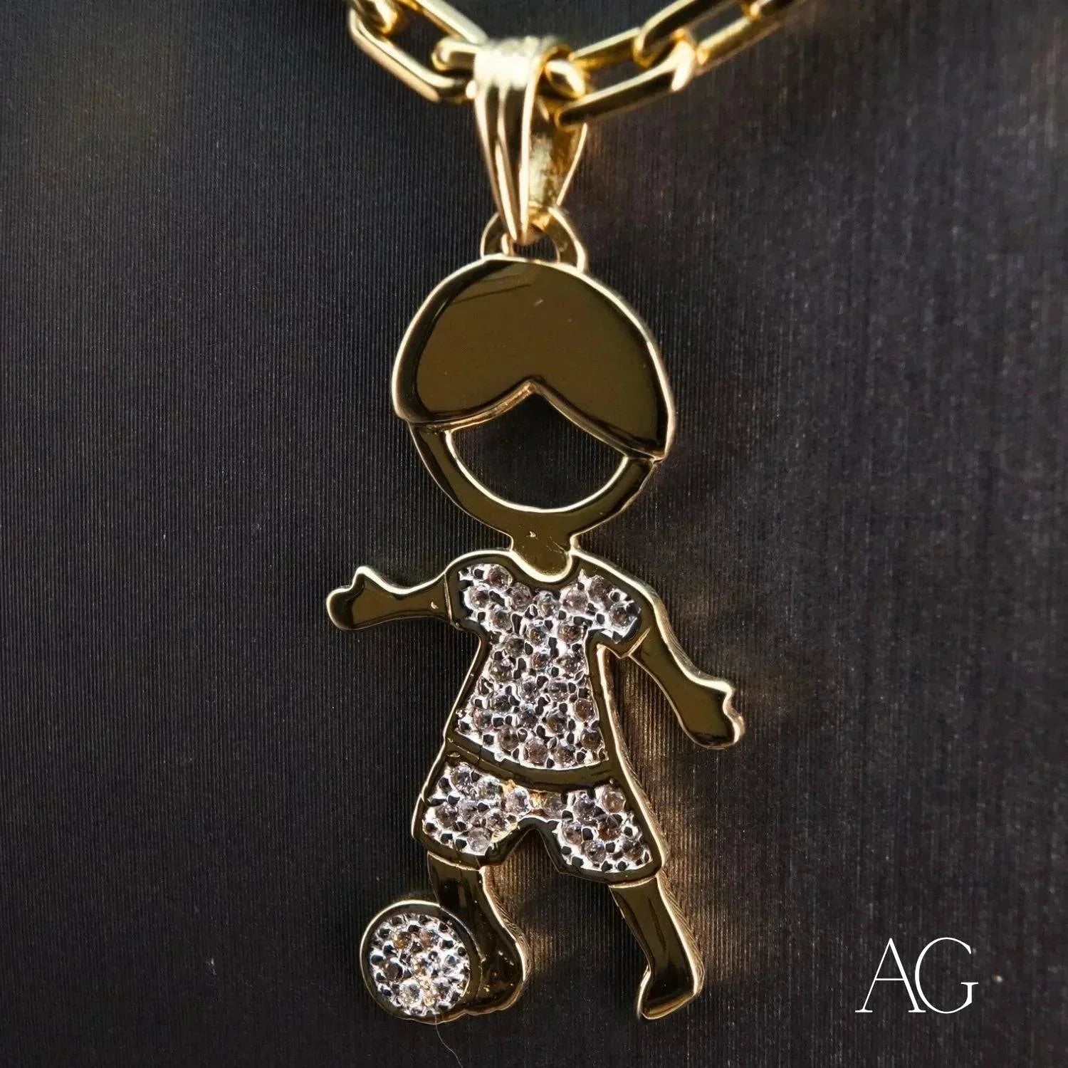 Enchanting 18K gold Boy doll pendant with CZ accents and soccer ball on a chain