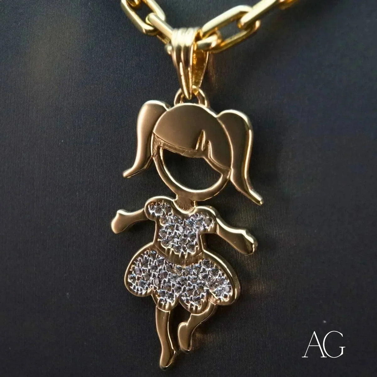 Enchanting 18K gold Girl doll pendant with CZ-accented dress shown on a chain