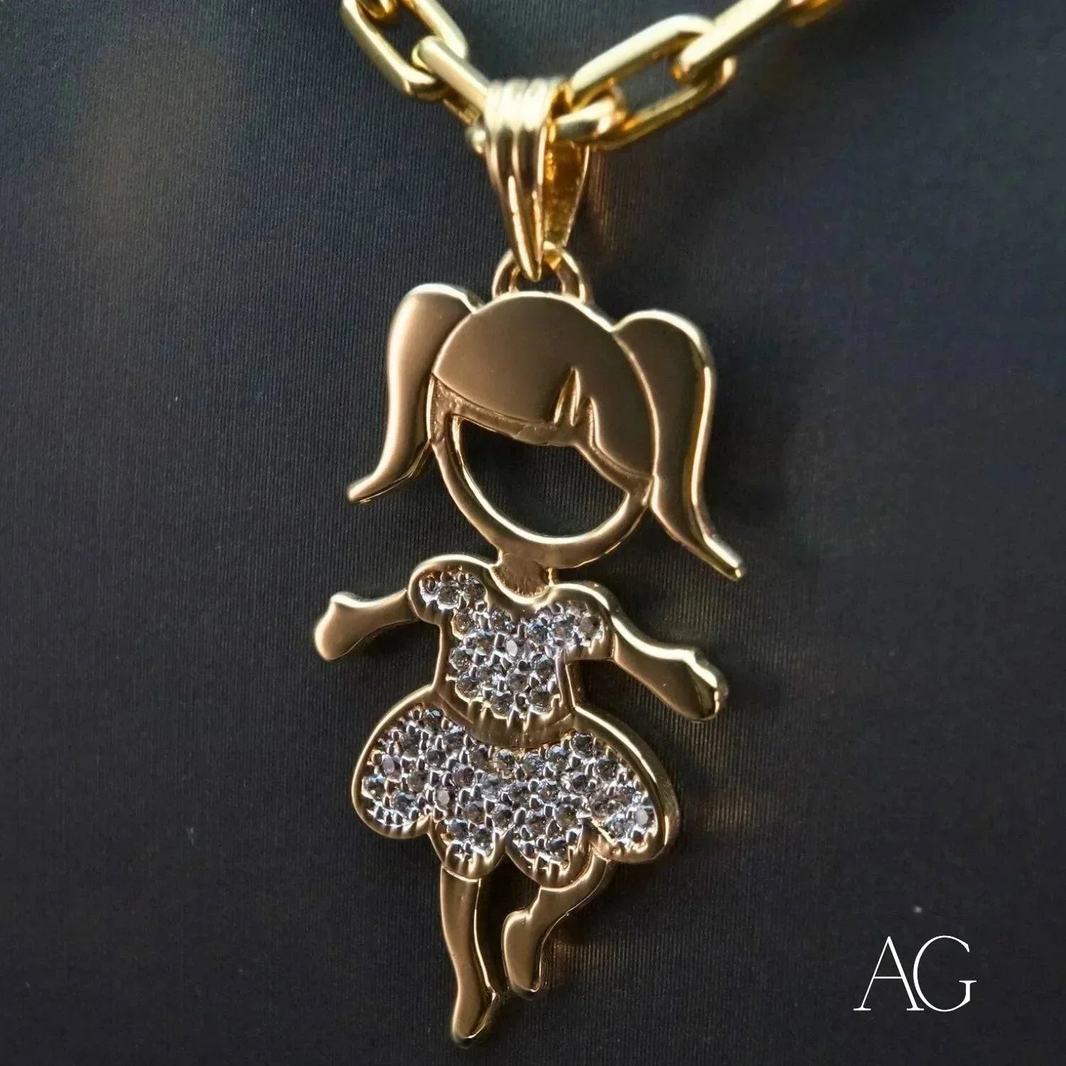 Enchanting 18K gold Girl doll pendant with CZ-accented dress shown on a chain