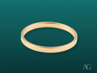Polished yellow gold Essence Linea 2mm ring in art gold jewelry