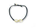 Stunning 18k gold infinity bracelet with black cord and charm