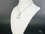 Silver chain necklace with 18k white gold pendant featuring a clear gemstone in Eternal Frost style