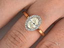 Oval diamond eternal halo engagement ring with delicate rose gold band