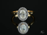 Oval diamond eternal halo engagement ring in yellow gold