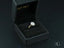 Eternal Halo Engagement Ring featuring an oval diamond with a delicate halo in a black box