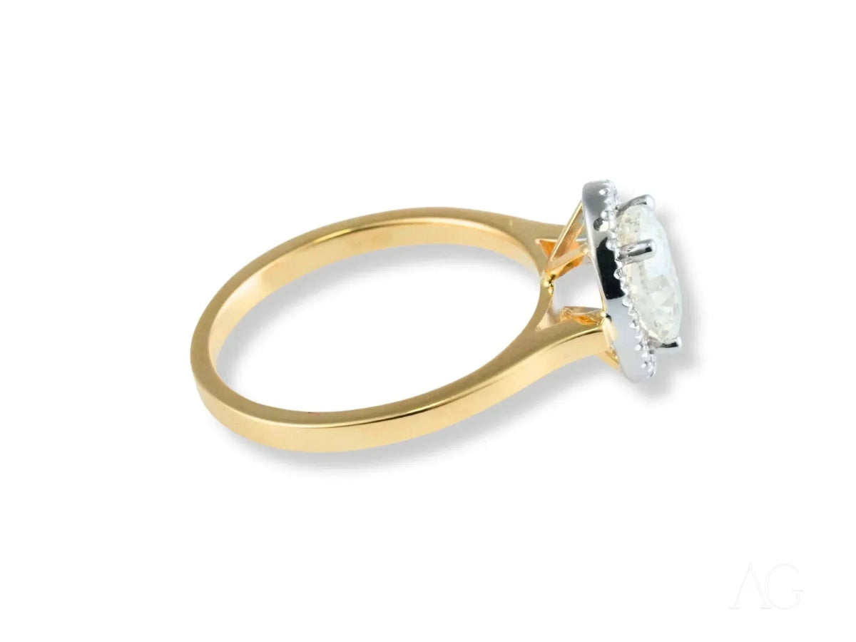 Eternal Halo Engagement Ring with pear-shaped diamond halo