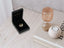 Black open jewelry box with 18k solid gold eternal heart pendant showcasing art gold jewelry