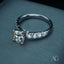 Platinum engagement ring with cushion-cut diamond and pavé side diamonds, ideal for art gold jewelry enthusiasts in Greater Boston Area