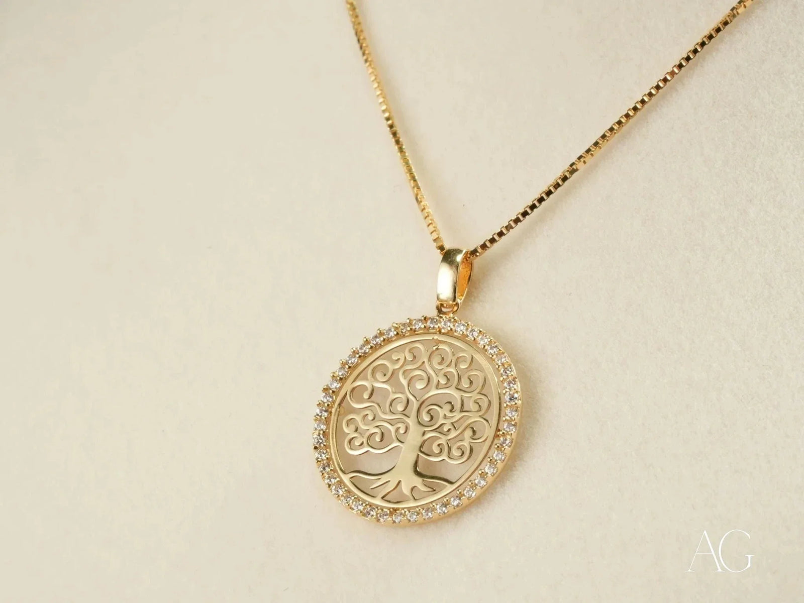 Eternal Roots gold Tree of Life pendant with clear stones