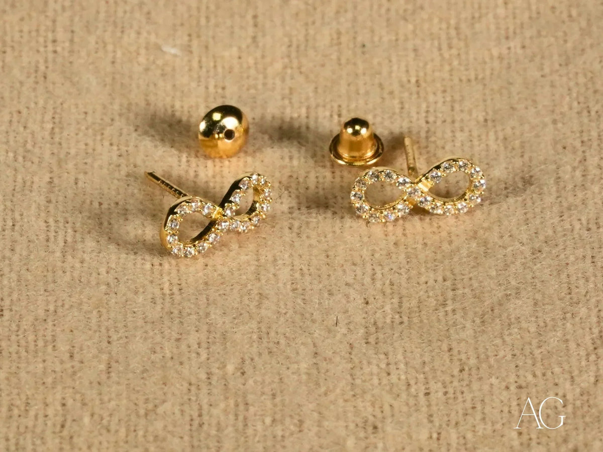 Eternal Spark 18K gold infinity CZ stud earrings with backs