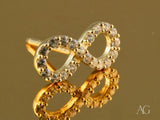 Eternal Spark 18K gold infinity nose stud with sparkling CZ stones