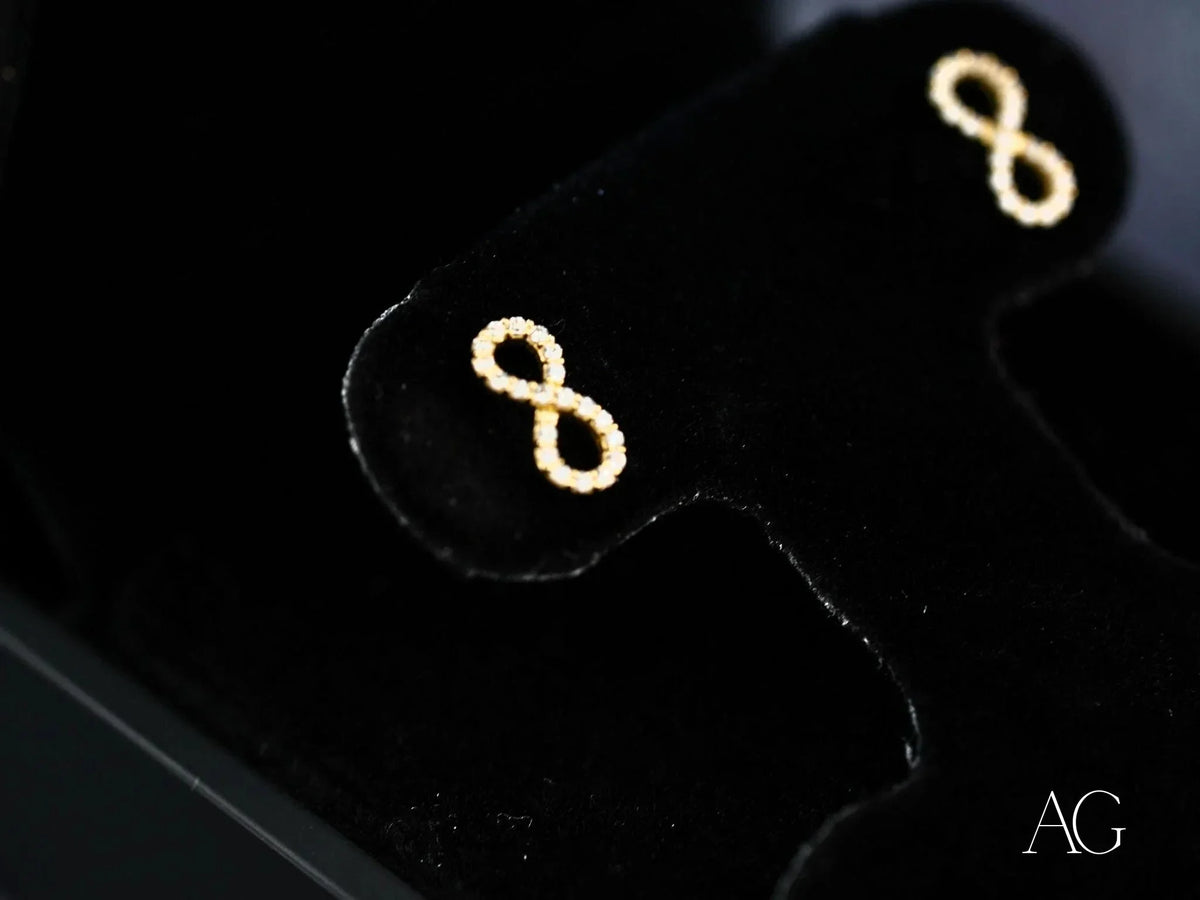 Eternal Spark 18K gold infinity CZ stud earrings