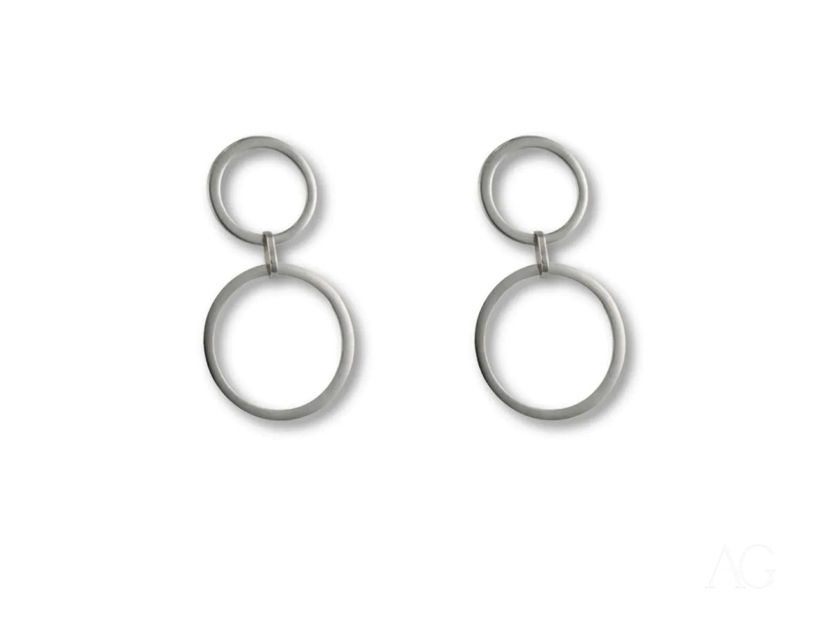 Ethereal Circles white gold dangle earrings with interconnected silver hoops