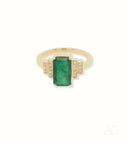 Exquisite 18k yellow gold ring with 2.3ct emerald-cut emerald and diamond accents