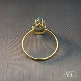 Exquisite blue topaz gold ring with pear-shaped gemstone