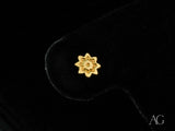 Floral Bloom 18K gold petite stud earring with textured flower center