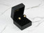 Gold flower-shaped diamond stud earrings from Floral Elegance collection in velvet box