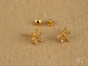 Floral Spark 18K gold CZ flower stud earrings with snowflake design