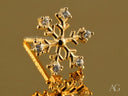 Floral Spark 18K gold CZ flower stud earring with snowflake gems