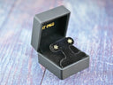 Floral Spark 18K gold CZ flower stud earrings in black velvet box