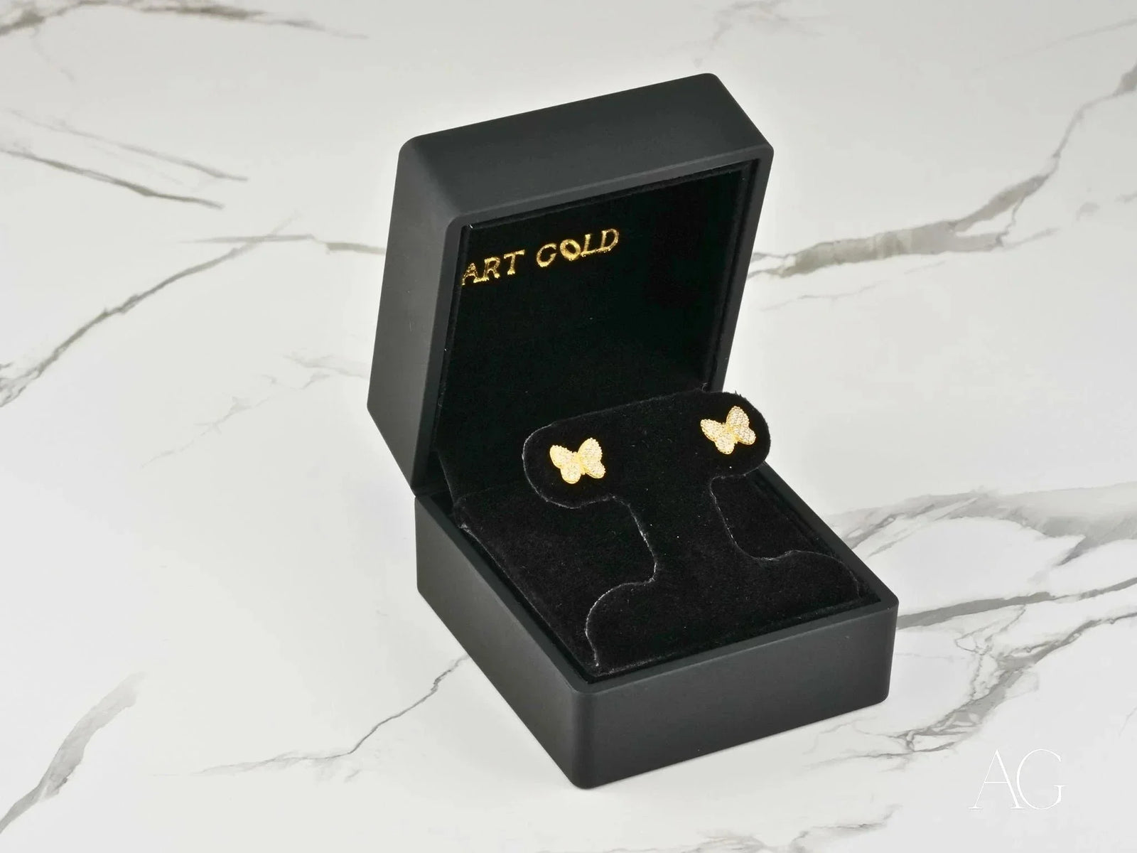 Fluttering Elegance 18K gold CZ butterfly earrings in velvet box
