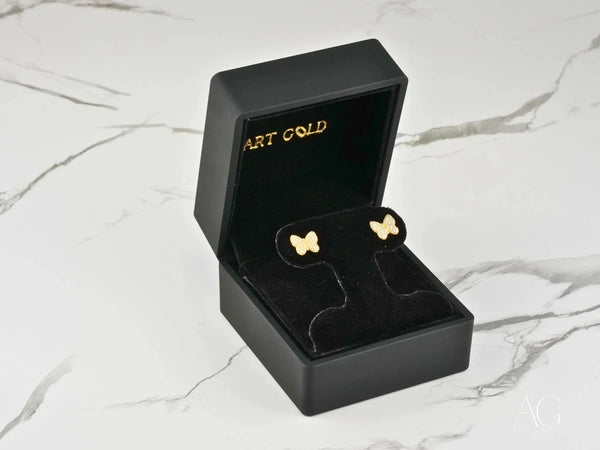 Fluttering Elegance 18K gold CZ butterfly earrings in velvet box