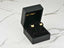 Gold CZ Butterfly Earrings from Fluttering Elegance in a black velvet jewelry box