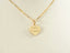 Gold best friends heart pendant from Forever Hearts in art gold jewelry style
